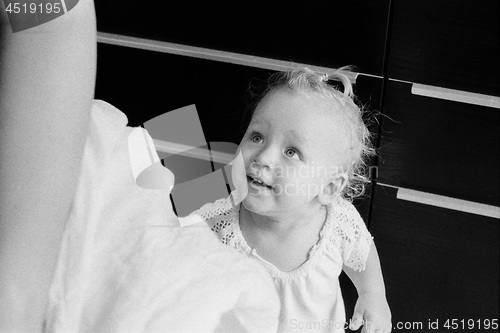 Image of Home portrait of baby girl in black and white