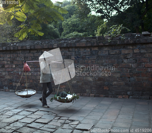 Image of A vietnam pedlar in Hanoi