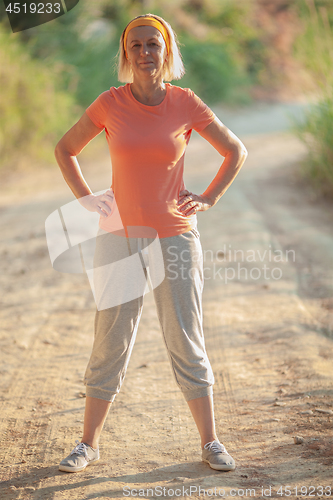 Image of Active senior woman is going to do sports