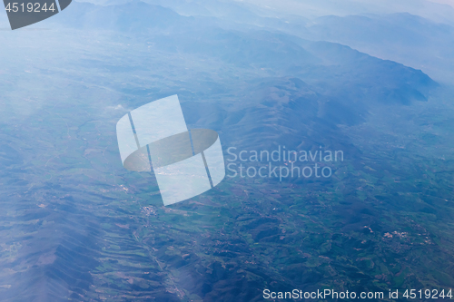 Image of Mountain view from an airplane window.
