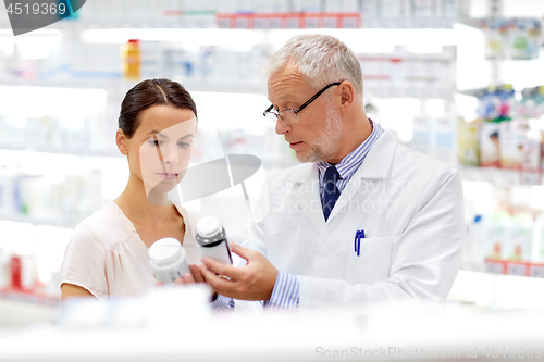 Image of apothecary and woman with drug at pharmacy