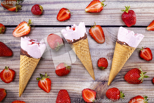 Image of Ice cream stick placed on a blue vintage wooden