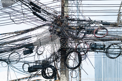 Image of Cables at a concrete pylon in Thailand