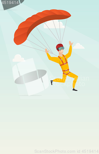Image of Young caucasian skydiver flying with a parachute.