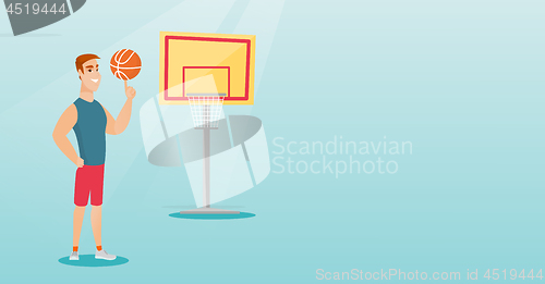 Image of Young caucasian basketball player spinning a ball.