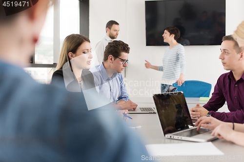 Image of Business Team At A Meeting at modern office building