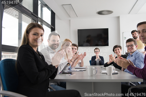 Image of Group of young people meeting in startup office