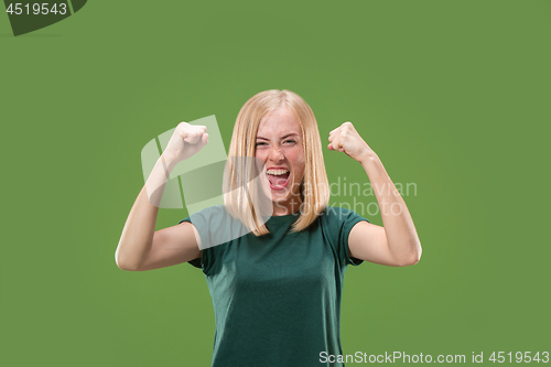 Image of Winning success woman happy ecstatic celebrating being a winner. Dynamic energetic image of female model