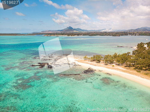 Image of Aerial view of beautiful tropical beach with turquoise sea. Tropical vacation paradise destination of D\'eau Douce and Ile aux Cerfs Mauritius
