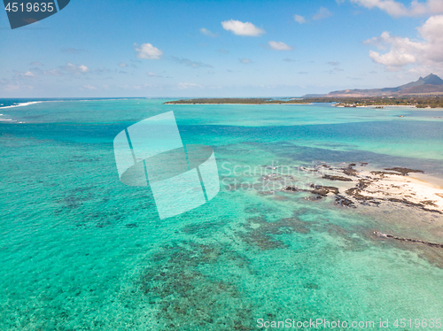 Image of Aerial view of beautiful tropical beach with turquoise sea. Tropical vacation paradise destination of D\'eau Douce and Ile aux Cerfs Mauritius