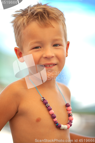 Image of Portrait of happy child on vacation