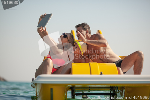 Image of Family selfie by the sea