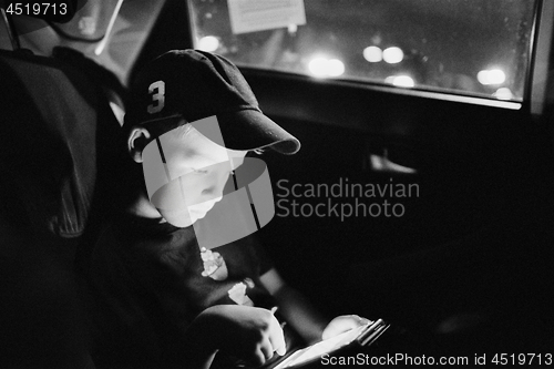 Image of A reading boy 