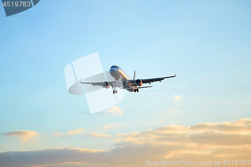 Image of Flying airplain over blue sky