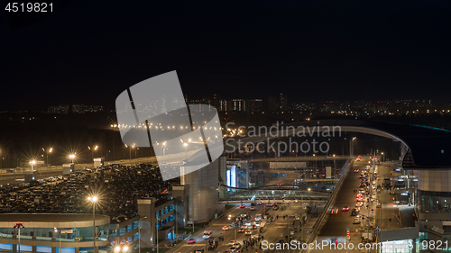 Image of Busy car traffic in night illuminated city