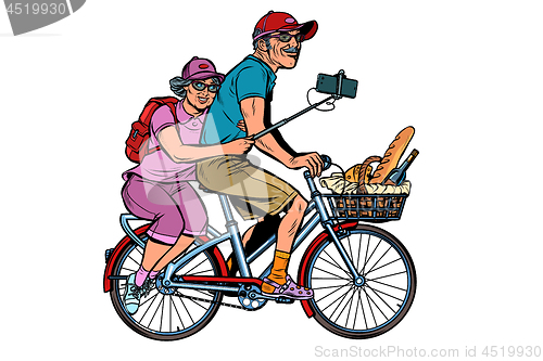 Image of old man and old lady travelers on bike, selfie on smartphone