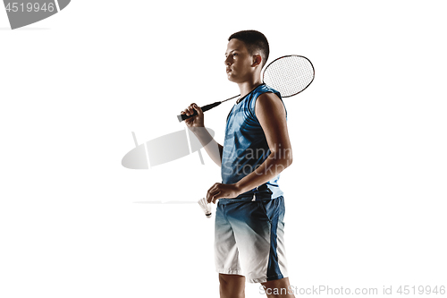 Image of Little boy playing badminton isolated on white studio background