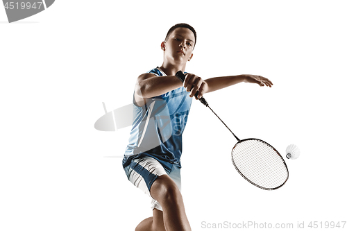 Image of Little boy playing badminton isolated on white studio background