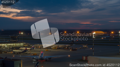 Image of Busy Terminal D in Sheremetyevo Airport at night Moscow, Russia