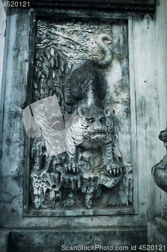 Image of Tiger bas-relief on Temple of Literature in Hanoi, Vietnam