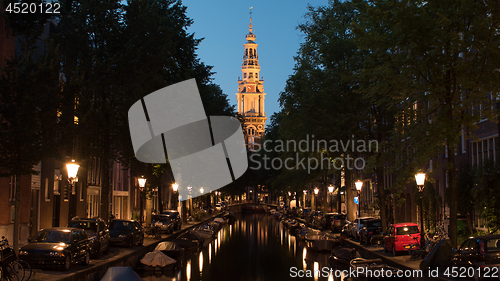 Image of Night view of Amsterdam with canal and Zuiderkerk, Netherlands