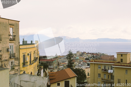 Image of City houses and Gulf of Naples in Italy.