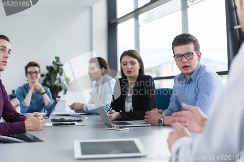Image of Business Team At A Meeting at modern office building