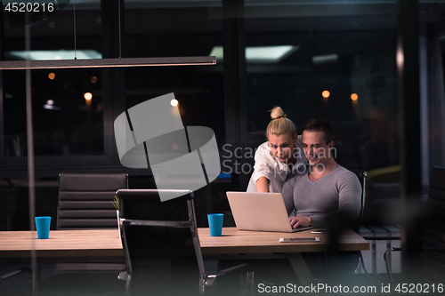 Image of young designers in the night office