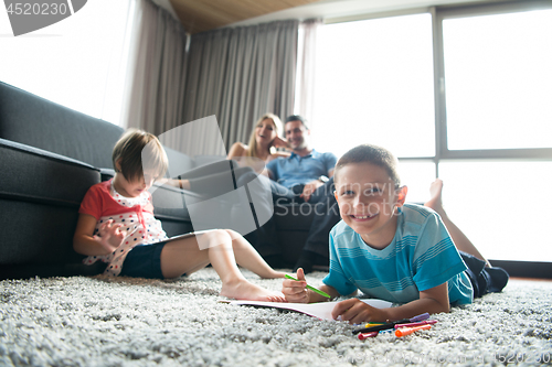 Image of young couple spending time with kids