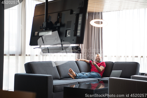 Image of handsome man enjoying free time