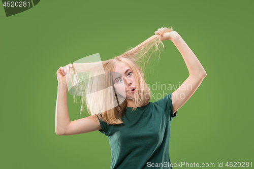 Image of The squint eyed woman with weird expression