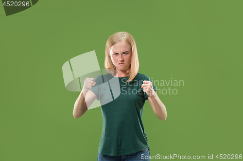 Image of A portrait of surprised screaming woman