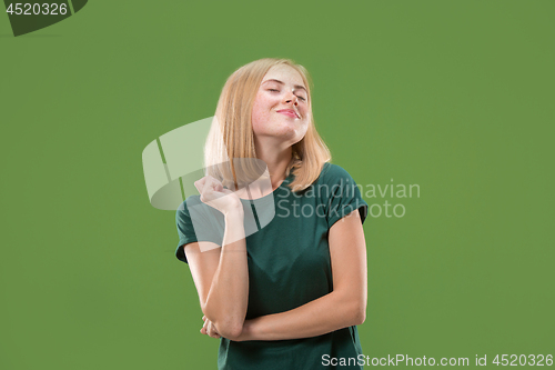 Image of happy woman. image of female model on green