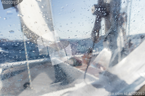 Image of Sailing yacht catamaran sailing in rough sea. Sailboat. Sailing concept.