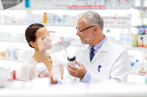 Image of apothecary and woman with drug at pharmacy