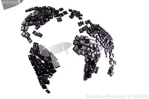 Image of black keyboard keys as world map