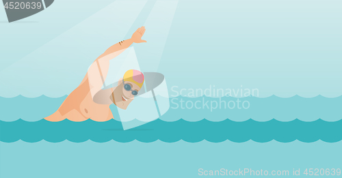 Image of Young caucasian sportsman swimming.