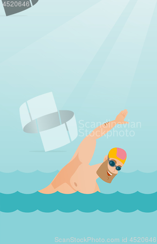 Image of Young caucasian sportsman swimming.