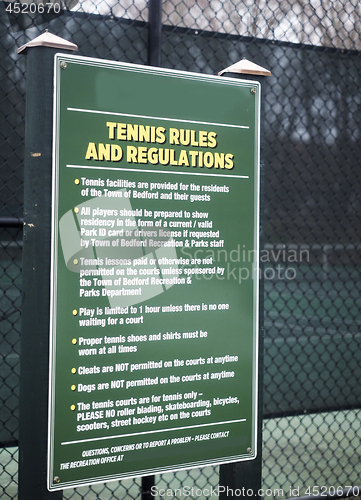 Image of tennis rules regulation sign public town tennis courts Bedford, 