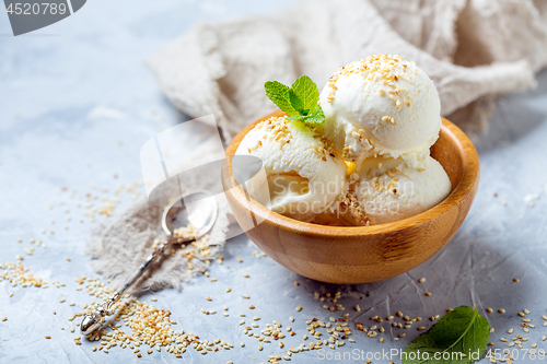 Image of Ice cream balls with sesame seed.