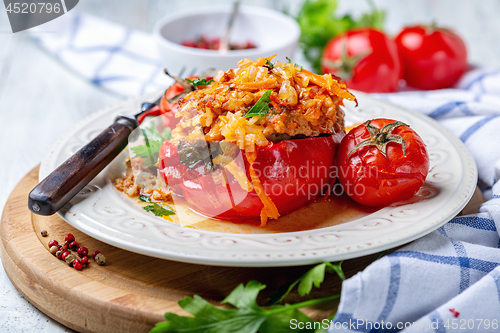 Image of Peppers with minced meat and tomatoes.