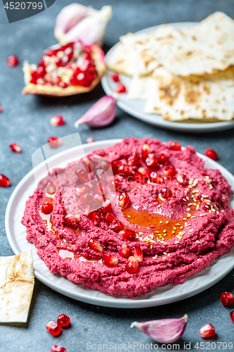 Image of Traditional homemade beetroot hummus.