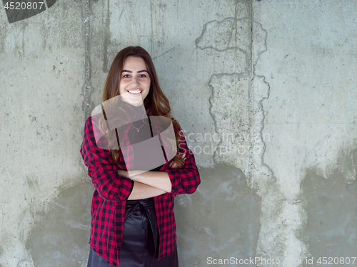 Image of portrait of young female architect on construction site