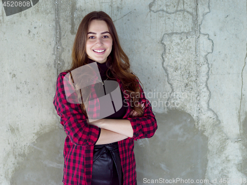 Image of portrait of young female architect on construction site