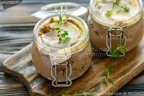 Image of Beef liver pate with fresh thyme.