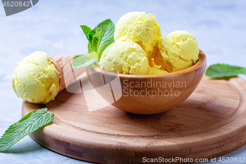 Image of Homemade golden colored turmeric ice cream.