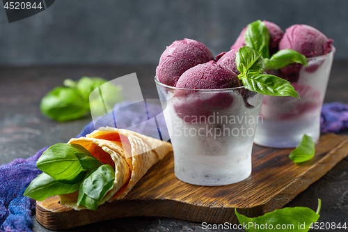 Image of Homemade blueberry ice cream with basil.
