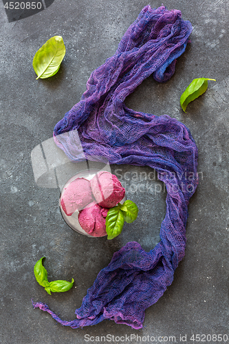 Image of Homemade blueberry ice cream with basil.