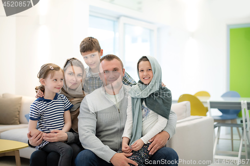 Image of portrait of young happy modern muslim family