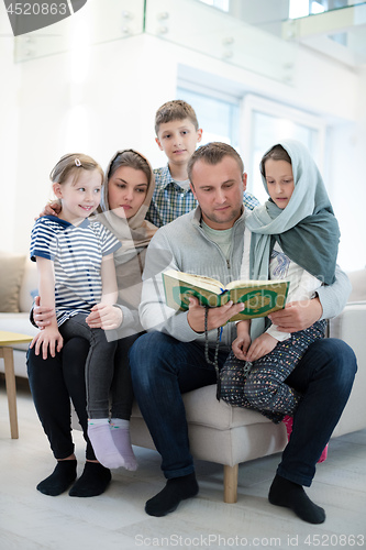 Image of portrait of young happy modern muslim family